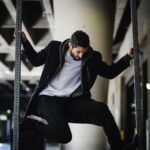 Azim Rizk Instagram - How did I get up here? 📸 @kep.exe . . . . . . . . . . . #spiderverse #marvel #spiderman #climbing #mensfashion #middleeastern #downtown #mondaymotivation #photography #lovethiscity #losangeles