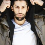 Azim Rizk Instagram - This is how I dramatically put on a hood. How’d I do? 😂 Shout out to the talented @kep.exe who makes me look badass no matter what I do! . . . . . . . . . . . #photography #bestphotographer #sweatshirt #sodramatic #mensfashion #middleeastern #iwanttoworkwith @missionworkshop #dudesinhoodies #curlyhair #menwithbeards #deathstare #intense