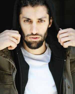 Azim Rizk Instagram - This is how I dramatically put on a hood. How’d I do? 😂 Shout out to the talented @kep.exe who makes me look badass no matter what I do!
.
.
.
.
.
.
.
.
.
.
.
#photography #bestphotographer #sweatshirt #sodramatic #mensfashion #middleeastern #iwanttoworkwith @missionworkshop #dudesinhoodies #curlyhair #menwithbeards #deathstare #intense