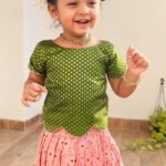 Baby Vedya Instagram - Nagu mathra 🥰 @ss_queens_wardrobe has the perfect Sankranti 🌾 Collection and we are obsessed with their designs 🥰 Shop for this Sankranti and get your kids dolled up for this festive season 😍 Outfit: @ss_queens_wardrobe Follow @babyvedya #babyvedya #babyfever #babiesofinstagram #babyshop #babymodel #babiesofig #babyfashion #babiesenthusiasts #babyphotography #2yearsold #babyreels #babyvideos #babygirl #baby #angel #instablackandwhite #babieswithstyle #cutiepies #model #newborn #instababy #iloveyou #reelsviralvideo #2years #trendingreel #viralvideo #reelsviral #cutebabiesofinstagram #instagood #viralposts