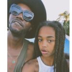 Baloji Tshiani Instagram - Texts go green on vacay mode wit my LOVE 🖤 Slide 1 wearing the shades of the talented @igordieryck X @komono to hate on this new IG’ad policy. ➡️➡️Normalize this, normalize that…The number of peeps that asked me if my daughter was my girlfriend make me want to scream that we need to normalize the HEALTY Daddy-Daughter relationship. Having a strong bond with your daughter should not be perceived as something abnormal! normative society limits. Paradise