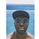 Baloji Tshiani Instagram - Texts go green on vacay mode wit my LOVE 🖤 Slide 1 wearing the shades of the talented @igordieryck X @komono to hate on this new IG’ad policy. ➡️➡️Normalize this, normalize that…The number of peeps that asked me if my daughter was my girlfriend make me want to scream that we need to normalize the HEALTY Daddy-Daughter relationship. Having a strong bond with your daughter should not be perceived as something abnormal! normative society limits. Paradise