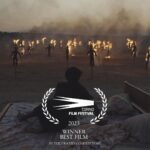 Baloji Tshiani Instagram - AUGURI ➡️ La France nous accorde une deuxième semaine: AUGURE EN SALLES MAINTENANT🇫🇷 ➡️AUGURE/OMEN WON BEST FILM film in Torino ( crazies selection) grew up in Liège with the Italian community (Sicilian and Turinese) who introduced me to their cinema and their Great Masters (Fellini, Pasolini, Visconti, Leone,..). Winning at @torinofilmfestival touched me deeply, like consolation with childhood. ➡️AUGURE GET SPECIAL MENTION AT @ficfacadie behind « Anatomy of a fall» Probably the only time my name will be mentioned next to Justine Triet masterpiece! Merci @vrintskolsteren for the poster rush!