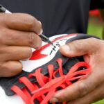 Barry Sanders Instagram - I'm at the @rocketclassic to raise awareness of neurofibromatosis (NF). @rocketmortgage will be auctioning off these signed 1 of 1 custom @nike @jumpman23 golf shoes to help fight NF - Learn more at https://nfforwarddetroit.org & follow me for details on the auction Fall 2023. Thanks to @Rocketmortgage @BetMGM @Prudential #Intersport @USNikeFootball @detroitlions for making this a stellar weekend for #TeamSanders and for bringing the @PGA to the #D.
