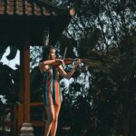 Birdy Nio FS Instagram - 帶上自己的琴，踏上一班前往峇里島的班機，然後用音樂描繪這個地方，島嶼的中心，一條溪流連結了各種旋律，一座森林貫穿了所有節奏，微風穿梭在夕陽照料的田野中，我們試圖用幾個和弦在那裡捕捉任何神的蹤跡。 壁畫，山洞，神廟，田園。 那些觸手可及的痕跡，都是旅人夢寐以求的信仰，而我們就這麼飄蕩在這個島嶼的中心，試圖透過音樂來明白自己為何在這。 捨棄了計畫與等待，接受所有旅程給予的過程，才發現靈感其實不需要等待，像候鳥一樣，時間到了，就會回來了。 你只需要用你想被看到的樣子，然後用你喜歡的方式呈現出來，那就是創作。 Camera / Sony A7S3 @sonytaiwan #用心流浪 #好好生活 #防曬不要擦太多 #浪人 #surf #surfing #underwaterphotography#adventures #landscapephotography #explore #nature #hippie #boho #bohostyle #bohemia Ubud, Bali, Indonesia