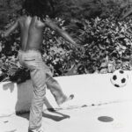 Bob Marley Instagram - “So if a fire mek it bun, and if a blood mek you run, Rasta de pon top!” #Revolution #bobmarley 📷 by @nevillegarrick, Nassau, Dec ‘76 ©️ Fifty-Six Hope Road Music Ltd. #todayinbobslife #reggae #football #futbol #soccer #sports