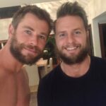 Bobby Holland Hanton Instagram - Happy birthday to one of the greatest humans on the planet @chrishemsworth !! Although he has kept me captive for over 10 years you can’t hate him! I’ve grown to love him like a big sister! Even though he’s average looking, hasn’t got a great rig and he’s a little short, his heart is the biggest known to man! HAVE THE BEST DAY EVER BIG DOG XO #happybirthday #chrishemsworth #bigdog