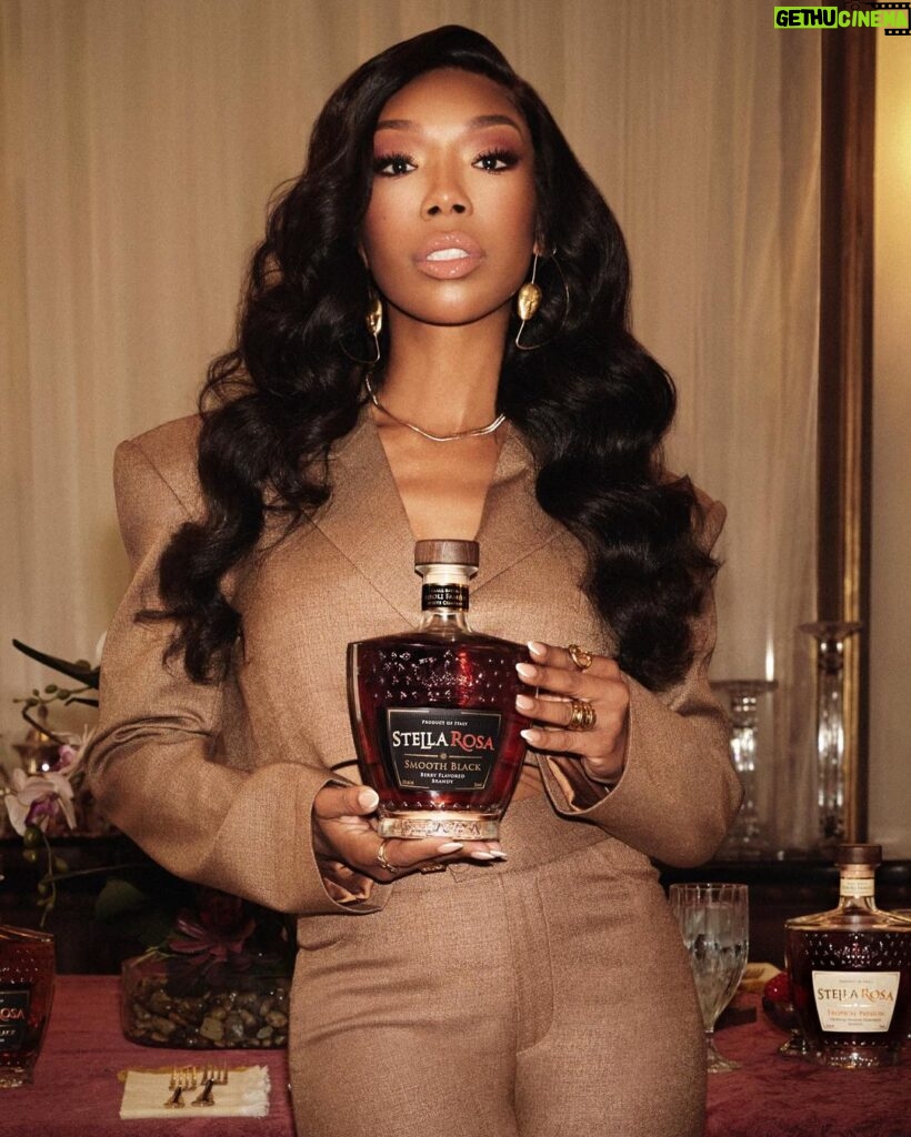Brandy Norwood Instagram - I’m so excited to introduce Stella Rosa’s NEW product @stellarosabrandy featuring me! It’s a hand-crafted, premium fruit-flavored brandy that comes in 3 unique flavors, Smooth Black, Honey Peach and Tropical Passion making it the perfect blend for any occasion. But we’ve got an even bolder surprise for you. Stella Rosa Brandy is throwing a launch party in Los Angeles! Click the link in my story and enter for the chance to win a trip to attend and meet ME!! Go follow @stellarosabrandy to join the hype! #SpiritofStellaRosa #StellaRosaBrandy #partner