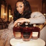 Brandy Norwood Instagram - I’m so excited to introduce Stella Rosa’s NEW product @stellarosabrandy featuring me! It’s a hand-crafted, premium fruit-flavored brandy that comes in 3 unique flavors, Smooth Black, Honey Peach and Tropical Passion making it the perfect blend for any occasion. But we’ve got an even bolder surprise for you. Stella Rosa Brandy is throwing a launch party in Los Angeles! Click the link in my story and enter for the chance to win a trip to attend and meet ME!! Go follow @stellarosabrandy to join the hype! #SpiritofStellaRosa #StellaRosaBrandy #partner