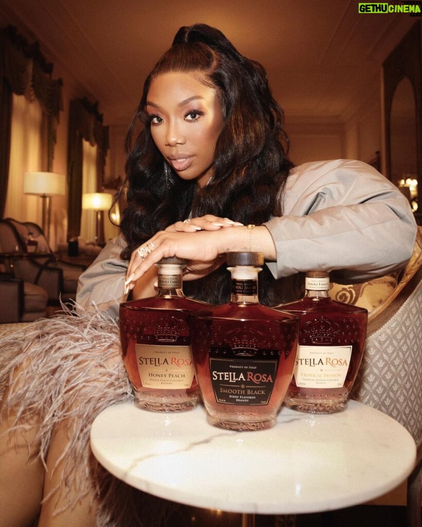 Brandy Norwood Instagram - I’m so excited to introduce Stella Rosa’s NEW product @stellarosabrandy featuring me! It’s a hand-crafted, premium fruit-flavored brandy that comes in 3 unique flavors, Smooth Black, Honey Peach and Tropical Passion making it the perfect blend for any occasion. But we’ve got an even bolder surprise for you. Stella Rosa Brandy is throwing a launch party in Los Angeles! Click the link in my story and enter for the chance to win a trip to attend and meet ME!! Go follow @stellarosabrandy to join the hype! #SpiritofStellaRosa #StellaRosaBrandy #partner