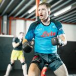 Brett Johns Instagram – Sparring some of the best fighters in the world, on a daily basis.

Massive thank you to the team as always.
@shoremixedmartialarts 

Having it off with another tasty scrapper December 8th

@sashshots 📷