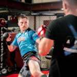 Brett Johns Instagram – Sparring some of the best fighters in the world, on a daily basis.

Massive thank you to the team as always.
@shoremixedmartialarts 

Having it off with another tasty scrapper December 8th

@sashshots 📷