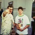 Brian Button Instagram - Two absolutely ridiculous(aka "bust") pictures, with 2 people that I truly admire and looked up to. @shemp_malone and #ChrisKanyon. Incredible memories while looking like a total jobber in my toxic avenger shirt(which I loved) and whatever the hell that hair and goatee was with Bruce...and a inside joke doing the robot at the empire state building with Kanyon and Iron Weber. #throwback #beforethemachine #innovatorofoffense #whobetta #ash #groovy #evildead #armyofdarkness