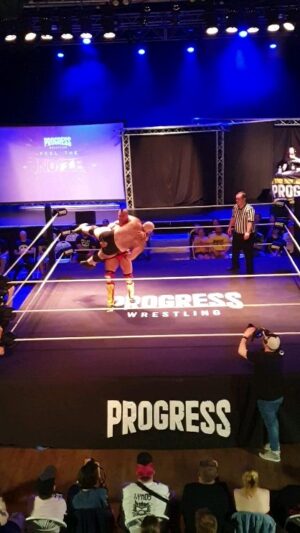 Brian Button Instagram - Hater/Troll: "Well, I could throw Darby Allin around like that too. That's not that impressive." 

Cage: Hold my protein shake while I throw this 300 lbs of @damomackle over my head.

#machine #swolverine #progress #aew #bodyguy #strongboi