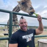 Brian Button Instagram - Your 2023 was cool? Well I don't know, was it "vanilla gorilla" super happy feeding a giraffe lettuce without looking, cool? That shirt goes so well too, some pretty epic meathead shit right there.