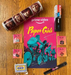 Brian K. Vaughan Instagram - NOW STREAMING?! Our friends at @primevideo have apparently dropped all eight episodes of PAPER GIRLS a day early for you fine folks, so you can watch it right now, just about anywhere in the world! And after you finish your binge, please hit the link in my bio to find out how to win this special prize pack, containing a poster signed by creator @cliffchiang and all four Paper Girls (with a badass collector’s tube to keep it safe!), a very special 12-pack of Paper Girls pencils designed by Cliff and manufactured by legendary art supplier @blackwing, four rare pins created for SDCC, a coveted slap bracelet (!), and even this delectable cassette-cookie (still fresh!) baked by Sugar Babies exclusively for our first screening. Oh, and a canvas Cleveland Preserver tote bag I totally forgot to include in this pic! Anyway, thanks so much for watching, and I hope you love this series as much as I do.
