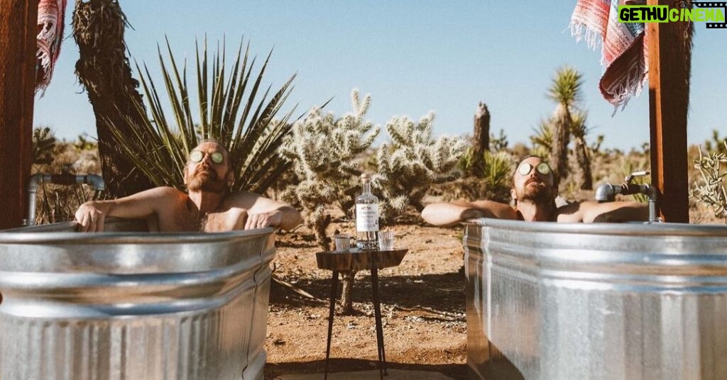 Bryan Cranston Instagram - Two guys laying around in two cowboy bathtubs celebrating two glorious years of slinging the best Mezcal out there. Happy birthday @Doshombres! It’s been a beautiful ride so far and it’s just the beginning. Salud.🥃