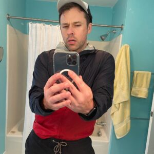 Bryan Safi Instagram - This summer, get that  1-2-3 easy to achieve look! 1. Grab a rain jacket 2. Tuck it into swim trunks. 3. Wear a hat that’s not remotely broken in. And you’re out the door! So simple. Now, go get this look and then get sex! #summer #sunmeroutfit #summerstyleinspo