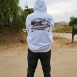Burt Jenner Instagram - Honestly, there are very few drivers I have respect for behind the wheel... but @kyleleduc99 is one of them. I had the pleasure of lining up against him in SST a couple times and was always impressed with his speed given the seat time he had in that series... he is a guy you could put in anything and he will make it go fast. I don't think I've ever even said a word to the man, but we've banged doors and dive bombed each other... combined with the respect I have for him, that means I consider him a brother from another mother... Kyle was recently diagnosed with stage 4 head and throat cancer. I don't know why out of all the bad news there is in this world, this news effected me so much... but it has. Probably because our age is so similar, he has a beautiful family, and because his persona seemed so invincible at the track. Ultimately Kyle is a man that refuses to ask for help, which makes me respect him more. But his dad kicked him under the bus and let the world know he does need financial help for the long road ahead. They have made a bunch of gear to show support, please consider helping out https://www.99duc.com/