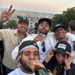 C.J. Wallace Instagram - I PUT THE C IN COMPROMISE. #FamilyNotAGroup #CKFS 🧶🇫🇷💫 Paris, France