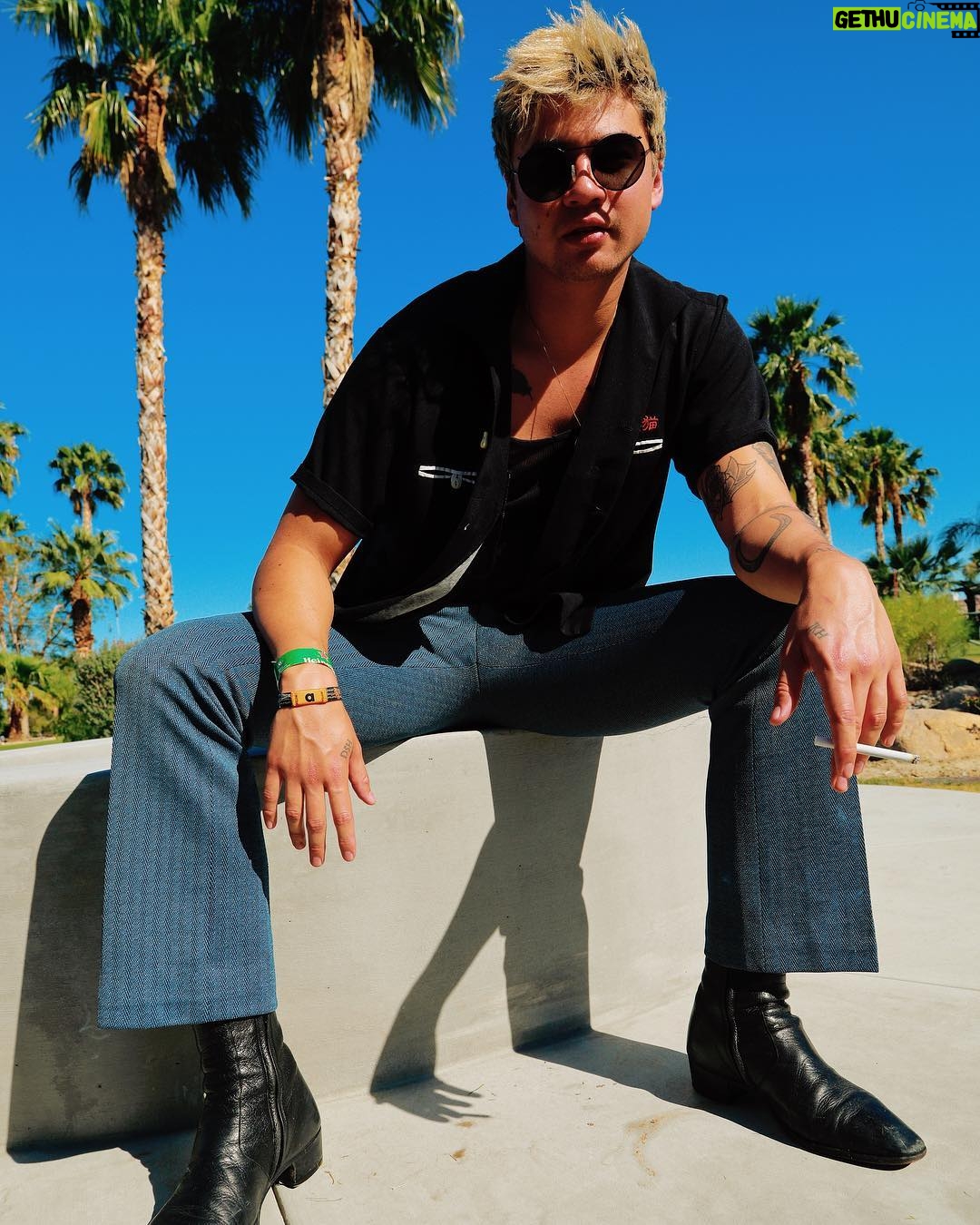 Calum Hood - 616.1K Likes - Yeah, your boy caved and went to Coachella this weekend. Photos by @tornblackjeans.