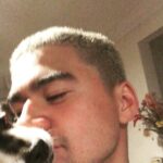 Calum Hood Instagram - The real reason you followed me - Duke. Love of my life. He doesn’t seem to be too amused though. Los Angeles, California
