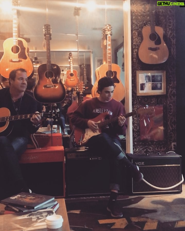 Cameron Boyce Instagram - 15 minutes after I met these fine gents yesterday they let me plug in one of Pete Townshend’s old strats. Thanks for the vibes!!! Merry Christmas Eve y’all 🤙 At Mike's Guitar Parlor