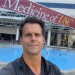 Cameron Mathison Instagram - It’s been 3 years since my kidney cancer surgery and I’m feeling amazing:) I’m back here at USC Keck for my CT scan, chest X-rays, and bloodwork to make sure I can say … 3 years cancer free🙏🏼 Lots of feelings coming up remembering Vanessa and I here early in the morning back in 2019 for my surgery. So so grateful for all the help, support and love we’ve received on this journey. Love you guys🙏🏼❤️ (I get the results in a few weeks) Keck Medicine of USC