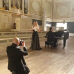 Camilla Kerslake Instagram – A career highlight. Being photographed by @kevintachman, making music in this incredible venue and wearing @leepatoncouture ❤️ 💙 💜