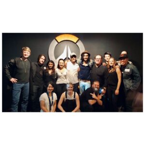 Cara Theobold Instagram - #tbt Looking back at Team Overwatch’s very first #Blizzcon back in 2016 (!!) what an amazing few days it was 🧡💫 ‘You know, the world could always use more heroes!’
.
I hope everyone enjoys #BlizzConline this weekend 🤩 #Blizz30 #Overwatch #Tracer