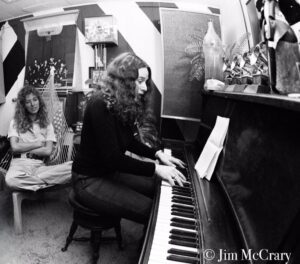 Carole King Instagram - Raise your hand if you’ve ever related to the lyrics of “It’s Too Late.”

Though people often mistakenly attribute the lyrics to me, they were written by Toni Stern. It was more than a half century ago when she handed them to me, typewritten, on a sheet of paper. I remember sitting down at the piano with the lyrics on the stand and hearing the music come out of me pretty much as you hear it on Tapestry.

Toni passed away on Wednesday, January 17, 2024. 😢 She was the first person after Gerry Goffin that I wrote with and had hits with, for example, “Where You Lead” and “Sweet Seasons.” When I moved to California in 1968, she was the epitome of a free-spirited Laurel Canyon woman. She lived in a hillside house with her dog, Arf, surrounded by books, record albums, plants and macrame.

We both had curly hair, and she called me “Curly Girl.” We shared a love for horses, and we wanted everyone in the world to be kind and compassionate.

Toni was also a poet. Her poems, not necessarily in rhyme, are quirky observations or anecdotes that take a surprising turn. Often, on my first read, they evoked a chuckle. You can find her poems on Instagram @tonisternpoet.

In the hereafter I imagine Toni riding bareback on a horse on a beach thinking of new ways to say things we all feel. And I know she’d join me in being grateful that our connection continues to live on in your appreciation of our songs.

My deepest sympathy to Toni’s lifelong partner, Jerry, and her family and friends. 🙏🏻