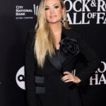 Carrie Underwood Instagram - I hope @georgemofficial would’ve liked this… I never really got to tell him what his voice meant to mine…and one of my greatest regrets is never having gotten the chance to sing with him. But it was an honor to sing in his place to help welcome him into the @rockhall last night. It is beyond deserved… Also, I may have made a fool of myself to @andrewjohnridgeley whilst fangirling a bit 😬… but he was so kind. What a night! A heartfelt congrats to all the inductees!!! #RockHall2023