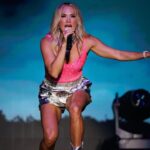 Carrie Underwood Instagram - Thanks for hanging with us on a soggy #Michigan night, Mt. Pleasant!!! ☔️☔️☔️ You all were so sweet to us at the @soaringeaglecasino ❤️ We’ll see you next time! #SoggyFunGuys #TwoSteppinEd #HowsMyHair 📸: @jeffjohnsonimages