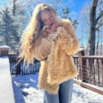 Carson Meyer Instagram – I traded in California sunshine for the occasional -17 degree snow day to live in a log cabin in the woods and I wouldn’t have it any other way. 

Jacket of my dreams designed by @baba.bytasha