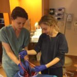 Carson Meyer Instagram - Came across this photo of me at one of the first births I attended in 2016. It was the birth of a very special mama friend in my life who has since given birth to two more boys. The most recent one weighing 11.6lbs at birth! Yes…he was born vaginally without complication because women’s bodies are magic and because this mama knew how to advocate for herself. She chose to birth with midwives who believe in her ability to birth big babies! Looking back at this photo makes me heart happy because I can see how happy this work makes me. People ask me all the time why I became a doula. It all started after seeing the @businessofbeingborn . This film literally changed the course of my life which has had a ripple effect on my own birth and motherhood experience. Forever grateful to @abbyepsteinxoxo and @rickilake for being my guiding lights. Today @businessofbeingborn is celebrating 15 years of delivering the truth! This film changed the births and lives of so many and is something I recommend every single one of my clients watch to become more informed. This Mother’s Day you can watch the documentary for FREE worldwide from May 10 - 14! Get access at thebusinessof.life