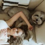 Carson Meyer Instagram - Cuddles with my babies🌷on the Loula @sixpennyhome sofa in lightweight linen. 📽 Photos by @krowkaphotography 🌞Bonnet crocheted by yours truly