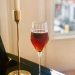 Casey Patterson Instagram - Goodnight Kiss ~ nightcap cocktail. @domperignonofficial Noces D’Or Cognac, Lajay Cassis, Burnt Sugar Syrup. Finish with expressed lemon and fresh blackberry 💋 #champagne #cocktails