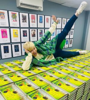 Cecelia Ahern Instagram - Don’t tell me I don’t bring you high quality content. 

Visited CPI Books today to see ‘In A Thousand Different Ways’ hot off the press. 

Then I climbed on them. 
Rolled around on them.
And signed them. 

Out April 13th.

😊💚