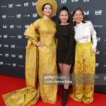 Chantal Thuy Instagram – This week at #TIFF was a dream come true. It’s always been on my bucket list to tell a Vietnamese Québécois story on the big screen and to be part of a film based on such a celebrated novel by @kimthuylythanh fulfilled a deep need as a storyteller. Not only is it the first of its kind for this community, but walking in her mother’s shoes helped me understand my own mom’s journey more deeply. In the process of shooting this film last year, I too became a first time mom.
To add to this, the most magical part of the night besides watching the film with my RU family and best friends, was being dressed in a custom traditional Vietnamese Áo Dài khăn đóng created by @thainguyenatelier. Thai not only made me feel beautiful in this dress (as a 8month postpartum mama, I was nervous about getting back on a red carpet 🤷🏻♀️), but he made me feel pride in representing and celebrating my culture. I’m holding onto everything I can that is a part of my Vietnamese heritage (language, food, customs) and wearing this beautiful Áo Dài khăn đóng certainly is an important part of it.
I’m writing this as my sister union in the US is on strike, and acknowledge that we’re going through an extremely difficult time right now. I’m thankful that SAG-AFTRA allowed me to promote this film (under a UDA contract). I’m proud to have worked on my first Canadian film, which was entirely funded by the Canadian & Quebec government agencies @la.sodec @telefilm_canada @amalga.prod @imminafilms @tiff_net
❤️ Gorgeous hair & makeup by @ivylammakeup Toronto International Film Festival (Tiff)
