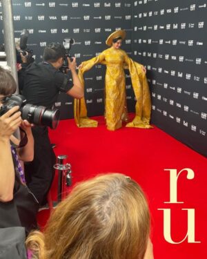 Chantal Thuy Instagram - This week at #TIFF was a dream come true. It’s always been on my bucket list to tell a Vietnamese Québécois story on the big screen and to be part of a film based on such a celebrated novel by @kimthuylythanh fulfilled a deep need as a storyteller. Not only is it the first of its kind for this community, but walking in her mother’s shoes helped me understand my own mom’s journey more deeply. In the process of shooting this film last year, I too became a first time mom. 

To add to this, the most magical part of the night besides watching the film with my RU family and best friends, was being dressed in a custom traditional Vietnamese Áo Dài khăn đóng created by @thainguyenatelier. Thai not only made me feel beautiful in this dress (as a 8month postpartum mama, I was nervous about getting back on a red carpet 🤷🏻‍♀️), but he made me feel pride in representing and celebrating my culture. I’m holding onto everything I can that is a part of my Vietnamese heritage (language, food, customs) and wearing this beautiful Áo Dài khăn đóng certainly is an important part of it.

I’m writing this as my sister union in the US is on strike, and acknowledge that we’re going through an extremely difficult time right now. I’m thankful that SAG-AFTRA allowed me to promote this film (under a UDA contract). I’m proud to have worked on my first Canadian film, which was entirely funded by the Canadian & Quebec government agencies @la.sodec @telefilm_canada @amalga.prod @imminafilms @tiff_net 

❤️ Gorgeous hair & makeup by @ivylammakeup