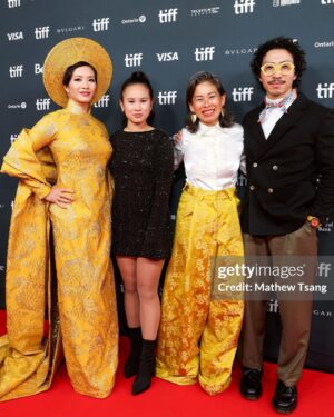 Chantal Thuy Instagram - This week at #TIFF was a dream come true. It’s always been on my bucket list to tell a Vietnamese Québécois story on the big screen and to be part of a film based on such a celebrated novel by @kimthuylythanh fulfilled a deep need as a storyteller. Not only is it the first of its kind for this community, but walking in her mother’s shoes helped me understand my own mom’s journey more deeply. In the process of shooting this film last year, I too became a first time mom. 

To add to this, the most magical part of the night besides watching the film with my RU family and best friends, was being dressed in a custom traditional Vietnamese Áo Dài khăn đóng created by @thainguyenatelier. Thai not only made me feel beautiful in this dress (as a 8month postpartum mama, I was nervous about getting back on a red carpet 🤷🏻‍♀️), but he made me feel pride in representing and celebrating my culture. I’m holding onto everything I can that is a part of my Vietnamese heritage (language, food, customs) and wearing this beautiful Áo Dài khăn đóng certainly is an important part of it.

I’m writing this as my sister union in the US is on strike, and acknowledge that we’re going through an extremely difficult time right now. I’m thankful that SAG-AFTRA allowed me to promote this film (under a UDA contract). I’m proud to have worked on my first Canadian film, which was entirely funded by the Canadian & Quebec government agencies @la.sodec @telefilm_canada @amalga.prod @imminafilms @tiff_net 

❤️ Gorgeous hair & makeup by @ivylammakeup