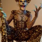 Charity Kase Instagram - Roar 🐯 One of my favourite looks bring out! Which other animals do you wanna see me monstify this year? 👀 Day 25 #366daysofdrag Bodysuit, hat, staff Fur flaredsuit by @narclsslsm Shoes by @natachamarro Video by @capturedbycorinne at @hotdog_studios #dailydrag #dragmonster #leopardlady London, United Kingdom