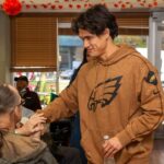 Charles Melton Instagram - It was a privilege to visit the Veterans Hospital with @philadelphiaeagles & @stoll_jack. Thank you for your service 🙏 🦅 💚