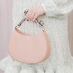 Chelsea Islan Instagram - Honored to be the Muse of Lanvin. Amazed by the unique and elegant soft pink hobo cat bag! Dressed up in @lanvin 🤍