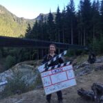 Chelsey Reist Instagram - lookie lookie what i just found. calling the shot while filming #harper and her #snipergame in episode 402 up on the ridge with one massive crane requiring one gigantic slate. #the100 #tbt #harpermcintyre #michaelblundell #edfraiman