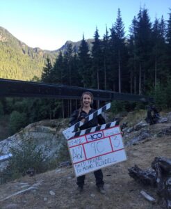 Chelsey Reist Instagram - lookie lookie what i just found. calling the shot while filming #harper and her #snipergame in episode 402 up on the ridge with one massive crane requiring one gigantic slate. #the100 #tbt #harpermcintyre #michaelblundell #edfraiman
