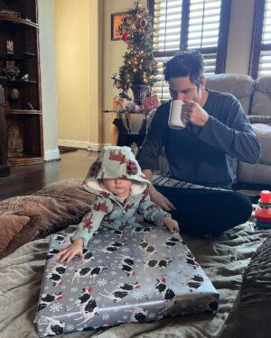 Cherie Jimenez Instagram - 12.25.22 ✨🎄 Christmas Morning with Phoenix ♥️🎸