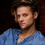 Chris Lamica Instagram - Don't mind me, I'm just randomly brooding while leaning against a barn wall.