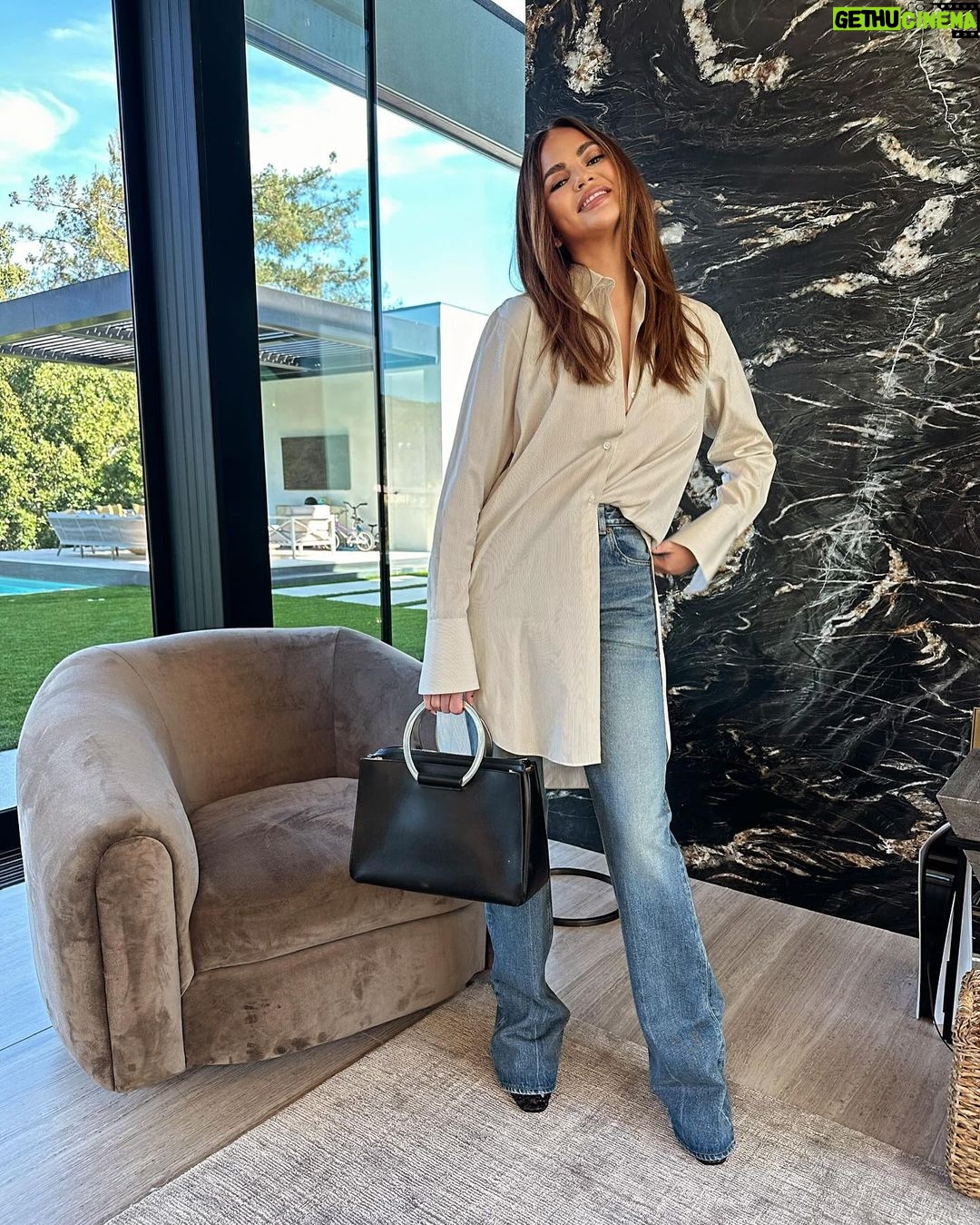 Chrissy Teigen Instagram - Chrissy Teigen struts her ample assets heading to meeting amidst BRUTAL arm burn shared on social media from corn - daily mail