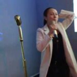 Christine Nguyen Instagram - The look on my colleague's face is everything here. 😅 🎶🎙🎶 #lovekaraoke #notasinger #MoxieKaraoke